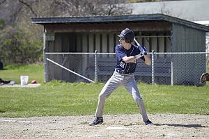 Landmark College student at bat at Dummerston baseball field